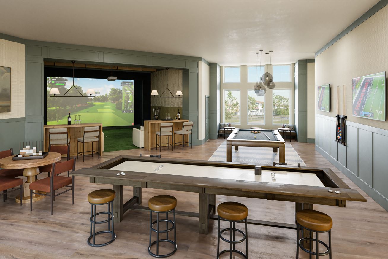Luxury game room with bar and golf simulator.