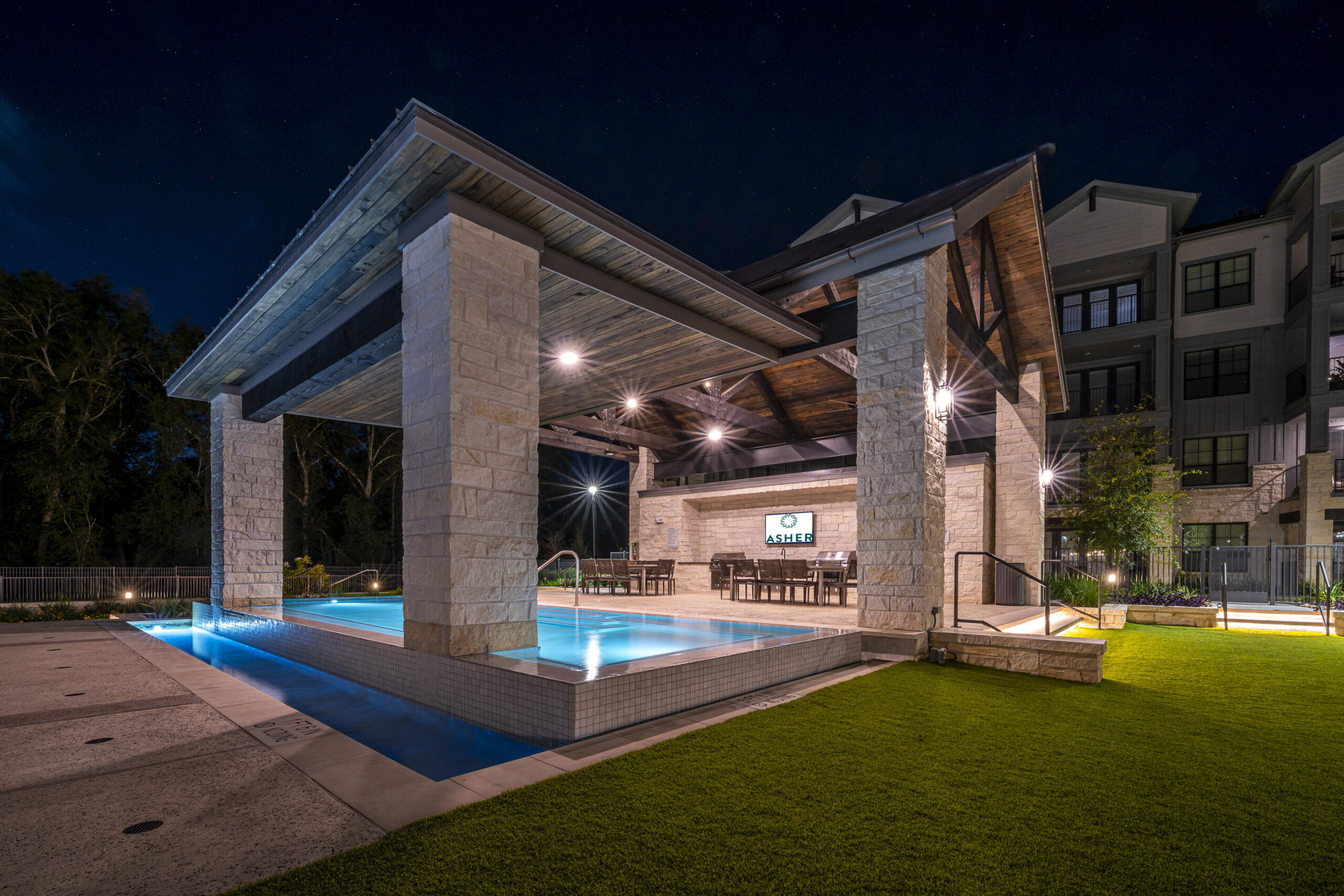 Asher Towne Lake pool with outdoor grilling area