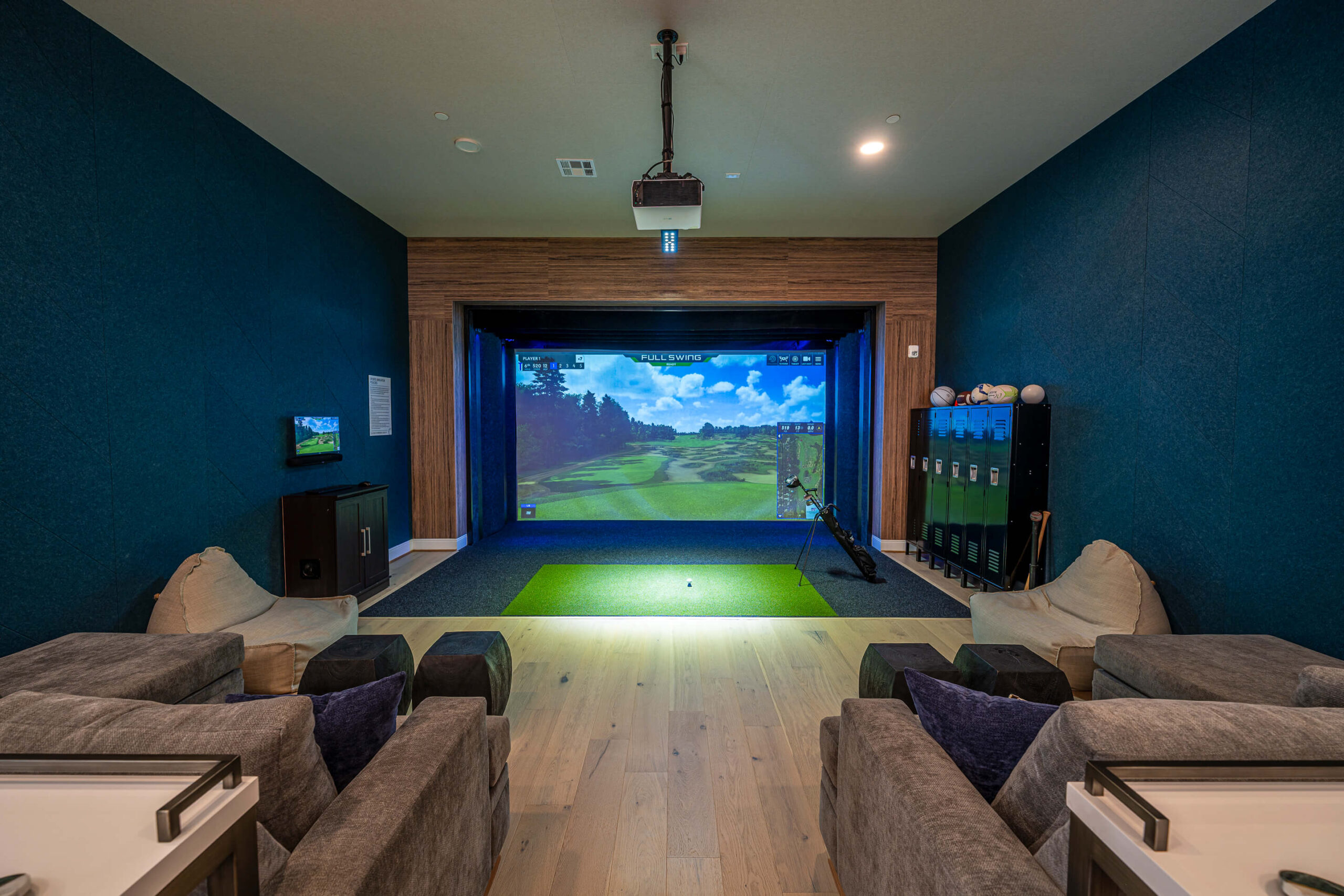 Golf simulator with seating and large space
