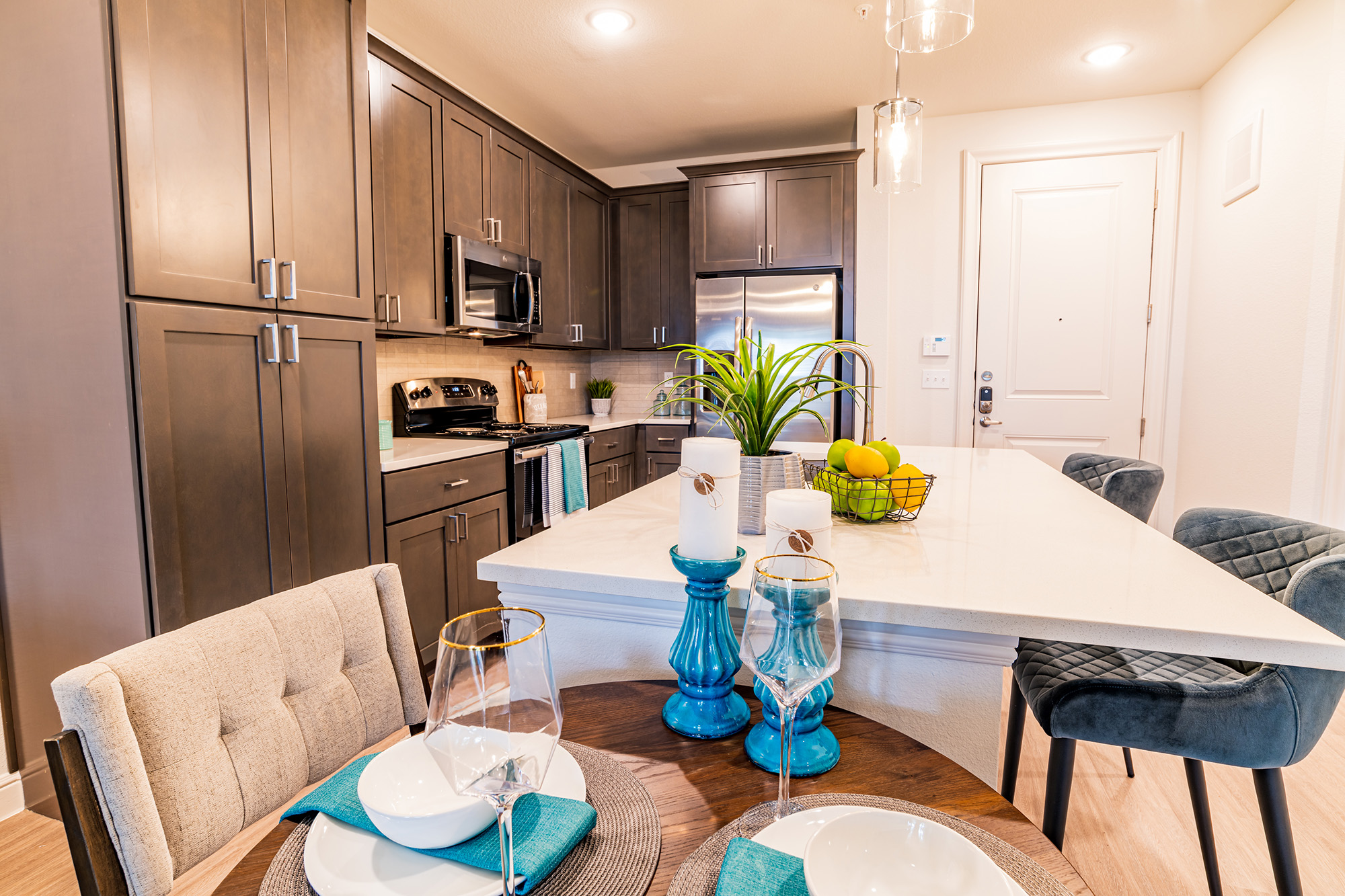 Kitchen and dining room at Asher by Caldwell Companies Brand New Houston Area Apartments