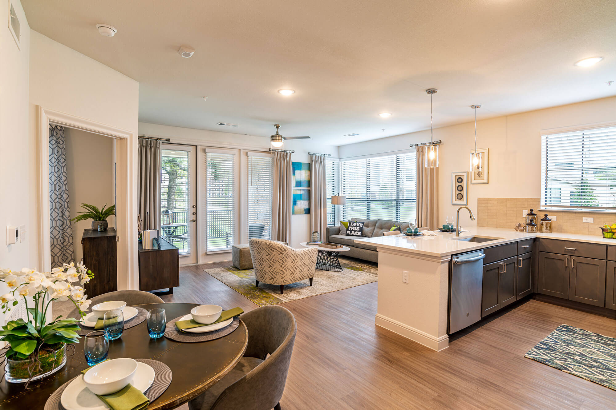 Dining/living/kitchen area of Asher new apartments in greater Houston